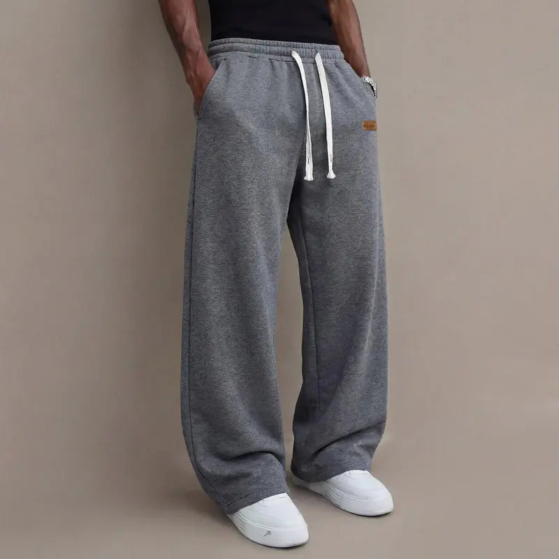 Men's casual pants for autumn, cotton-blendstretch fabric, comfortable athletic-casual longpants with a loose straight fit; suitable foreveryday wear and commuting; versatilesweatpants with drawstring; simple men'scasual pants.