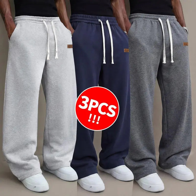 Men's casual pants for autumn, cotton-blendstretch fabric, comfortable athletic-casual longpants with a loose straight fit; suitable foreveryday wear and commuting; versatilesweatpants with drawstring; simple men'scasual pants.